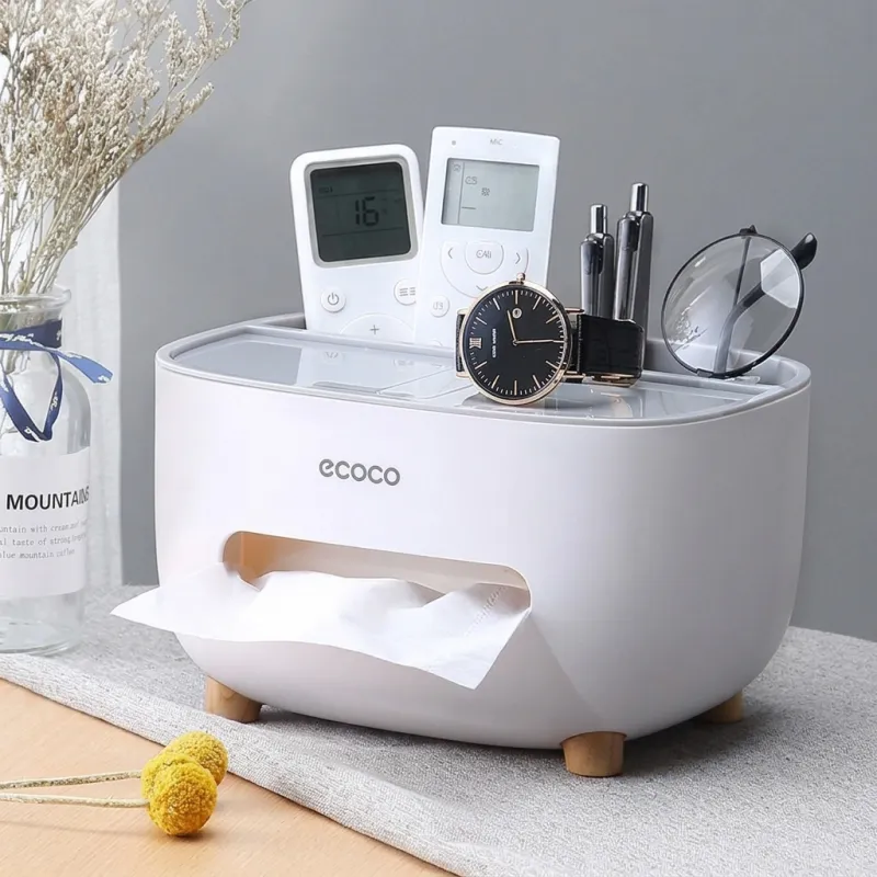 Ecoco Tissue Box Multi-Functional Organizer shown in four color variants on desks holding stationery and remotes.