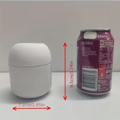 White Egg Humidifier side-by-side with a soda can showing dimensions 7.5cm width by 9.5cm height