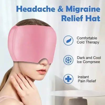 Woman wearing a pink Migraine Relief Cap over her eyes for comfortable headache compression relief.