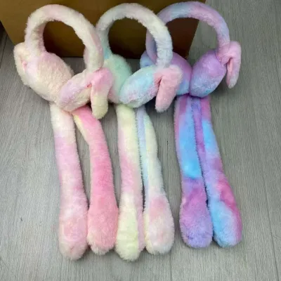 Three pairs of colorful plush moving bunny ear earmuffs in pastel rainbow shades displayed side by side.